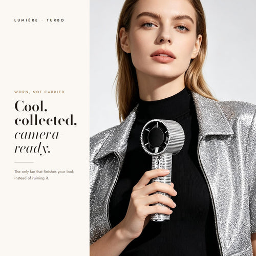 Model holding the Lumière crystal fan